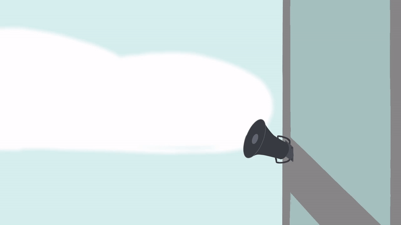 a bird flies toward a building, then up and away