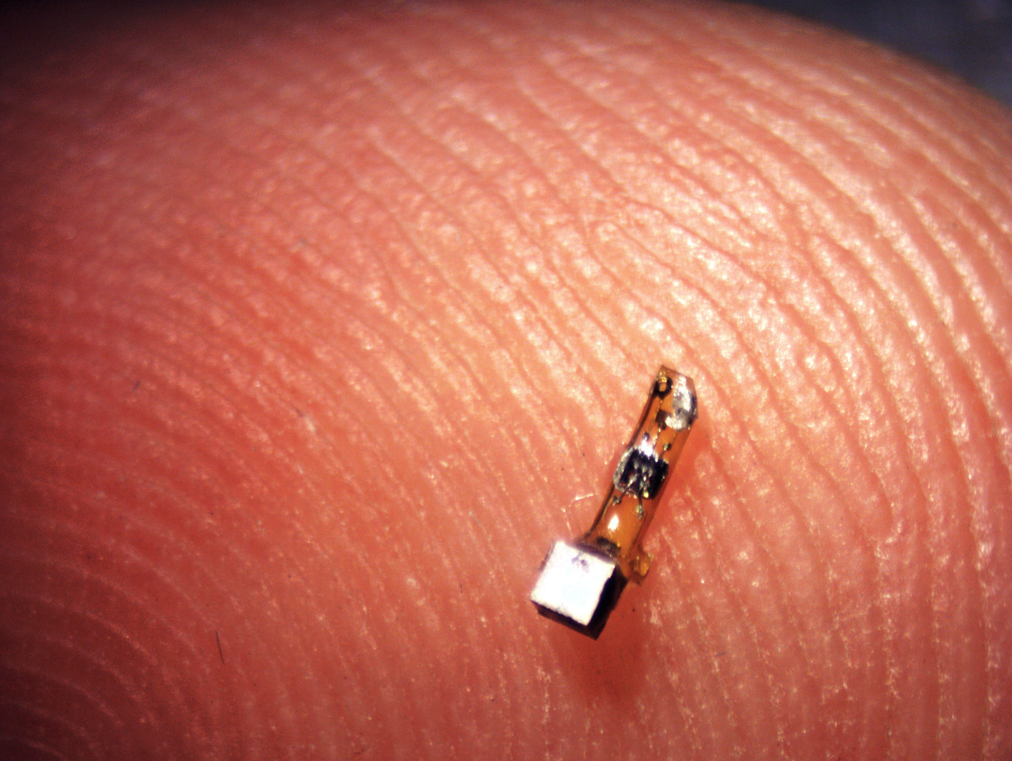Neural dust on a fingertip