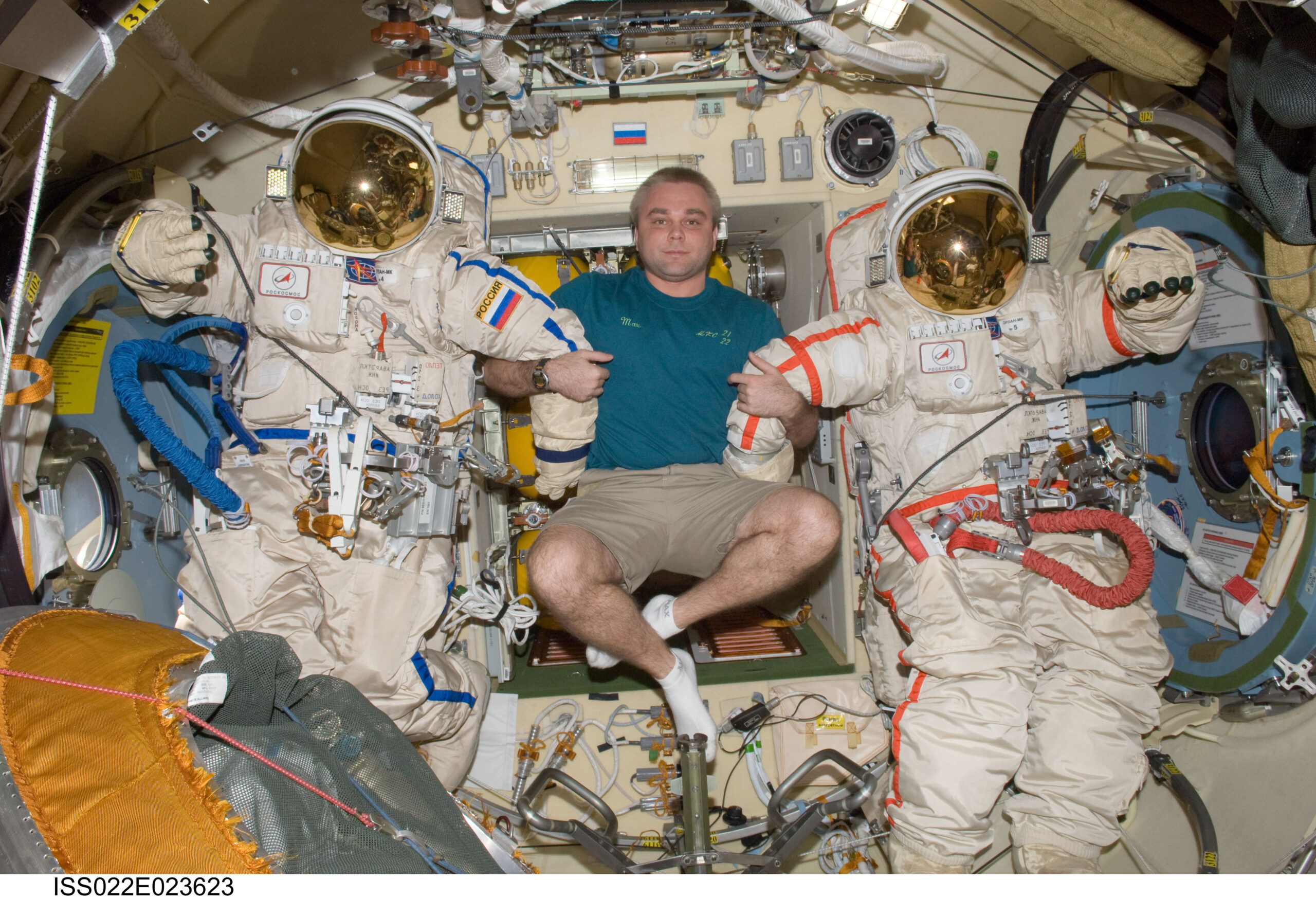 Cosmonaut Suraev with two Orlan suits