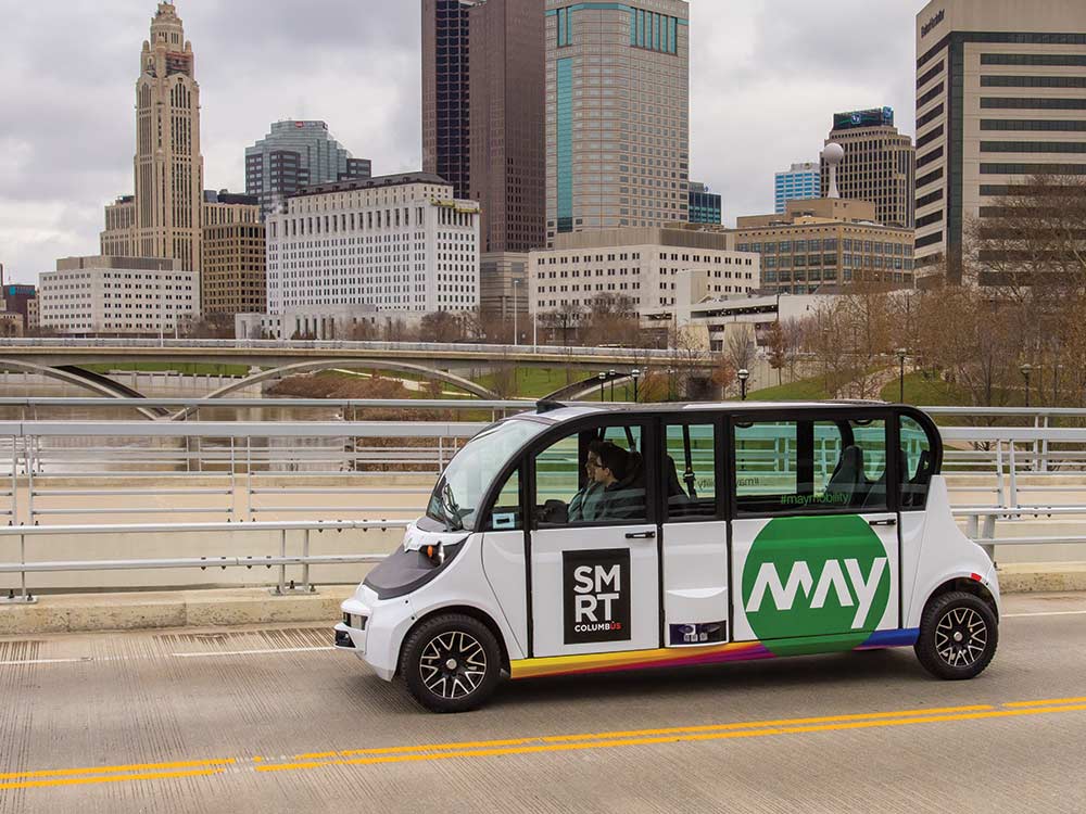 smart columbus shuttle on a bridge