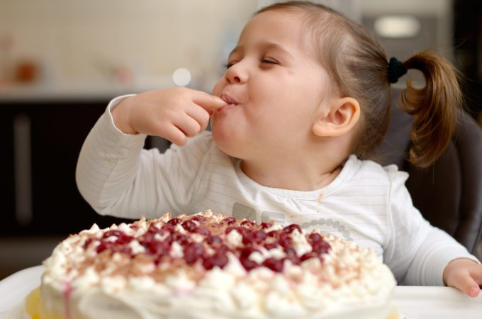 kid eating cake