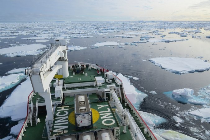 ship deck looking over icy water