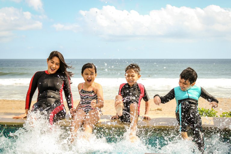 Women and children at the pool.