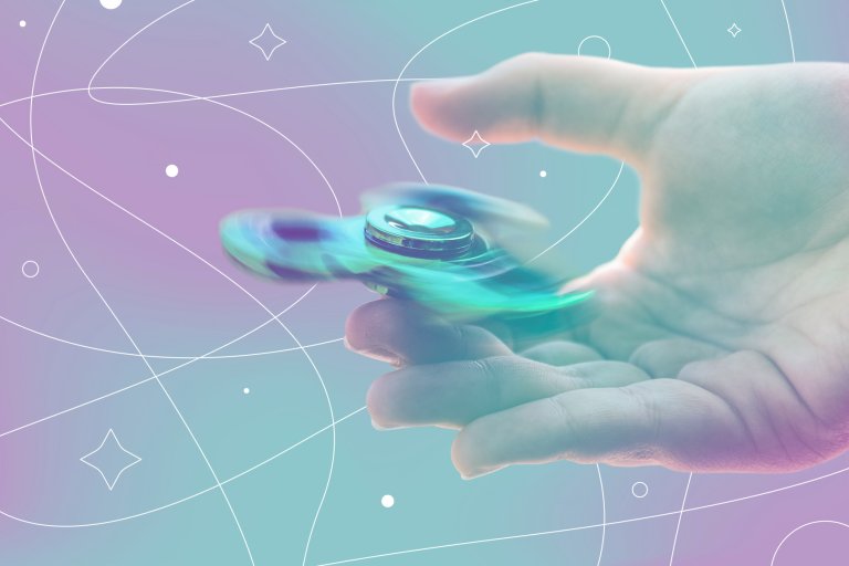 Fidget spinner spinning on a hand