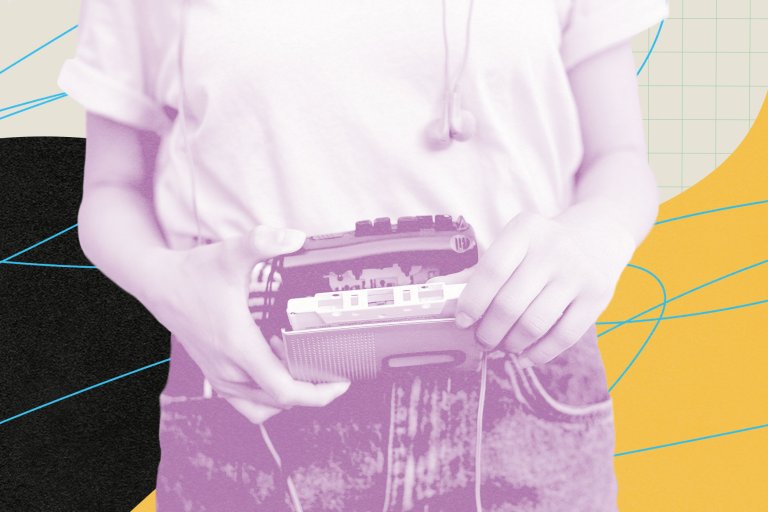 Person inserting cassette in cassette player.