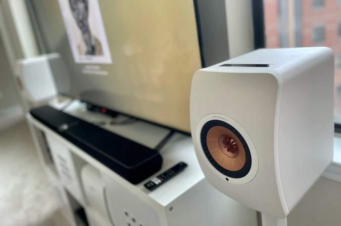  KEF LS50 Wireless II speakers flanking Tony's TV