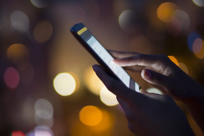 smartphone on a person's hand