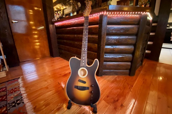 Fender Acoustasonic Player Telecaster guitar on a stand in a room