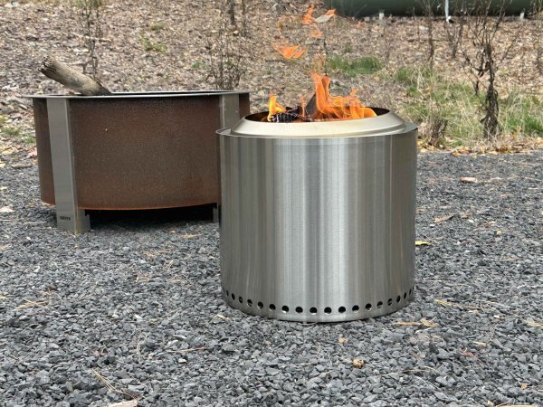  The Solo Stove Ranger 2.0 fire pit with a fire on gravel