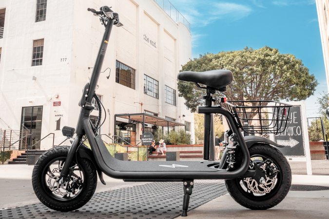 The Phantom Commuter R1 Pro parked outside of a building.