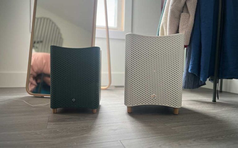 A Mila mini air purifier and a Mila air purifier next to each other.