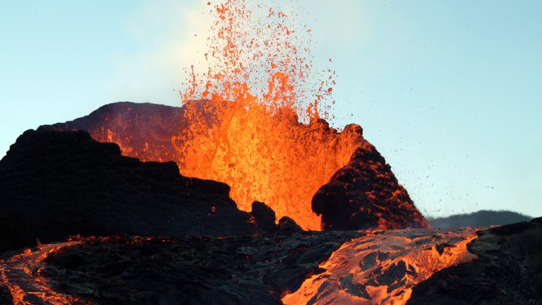 Lava rising out of erupting volcano