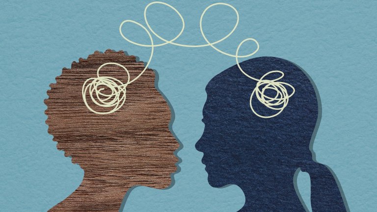 A young couple connected by a cable