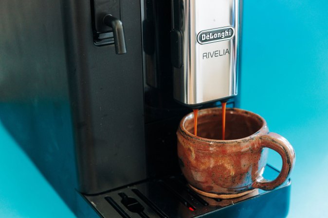 De'Longhi Rivelia automatic espresso machine pouring espresso
